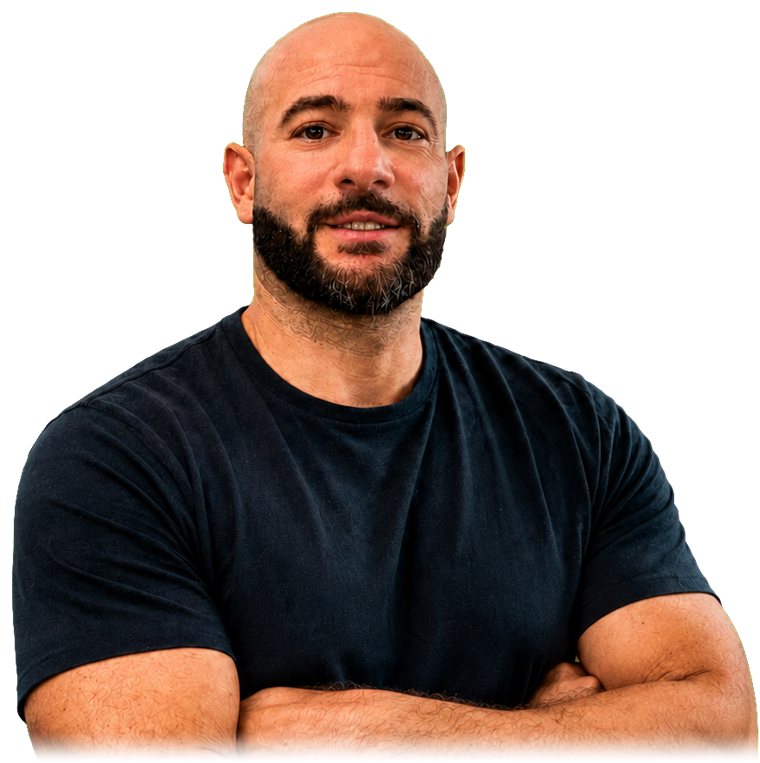 Greg, the founder of SupaBizzy, arms crossed and smiling.